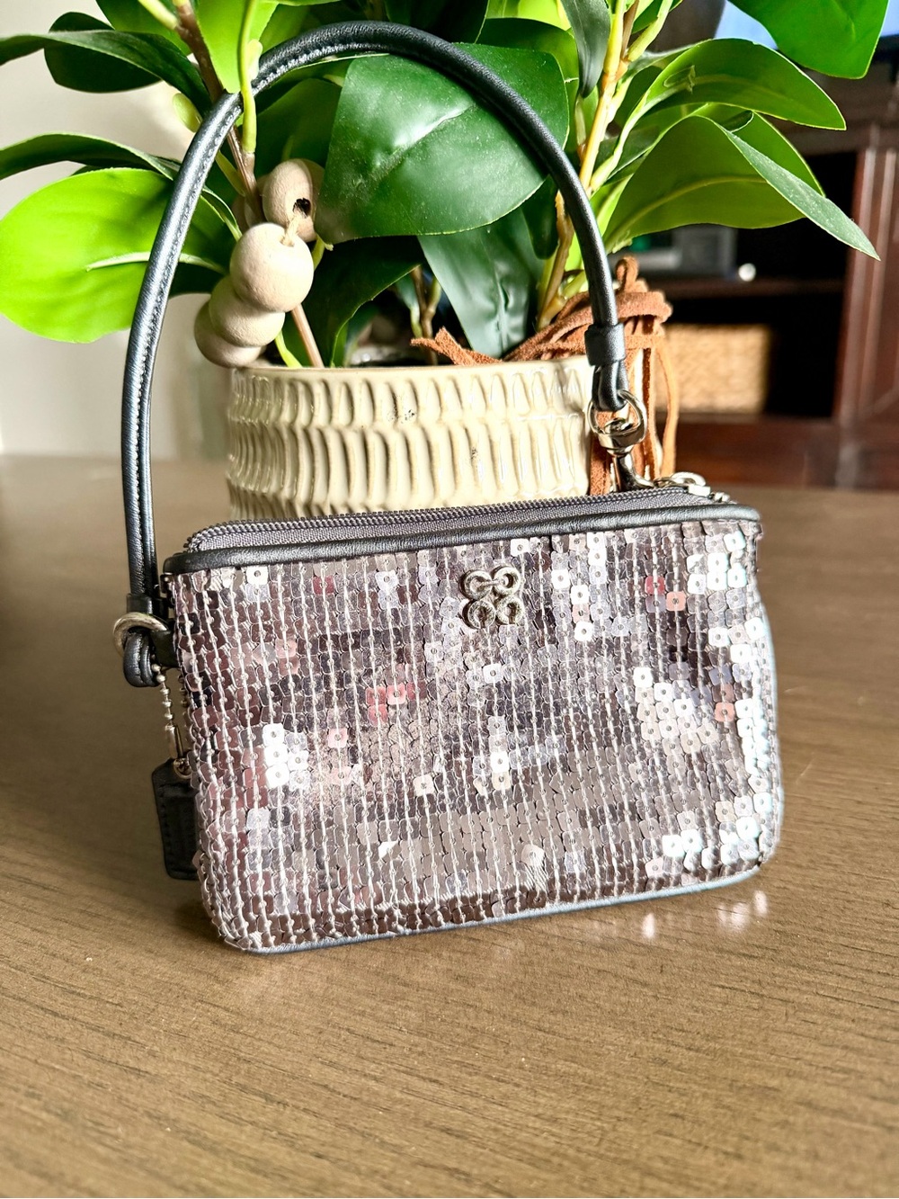 Coach Madison Sequin wristlet in silver and gunmetal pink lining hangtag EUC